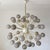 Italian sputnik chandelier with 40 glossy gray Murano glass globes mounted on brass frame in lacquered polished brass...