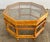 Vintage scorched bamboo octagonal coffee table in the style of Brighton Pavilion. Inset octagonal glass top. Minor age...