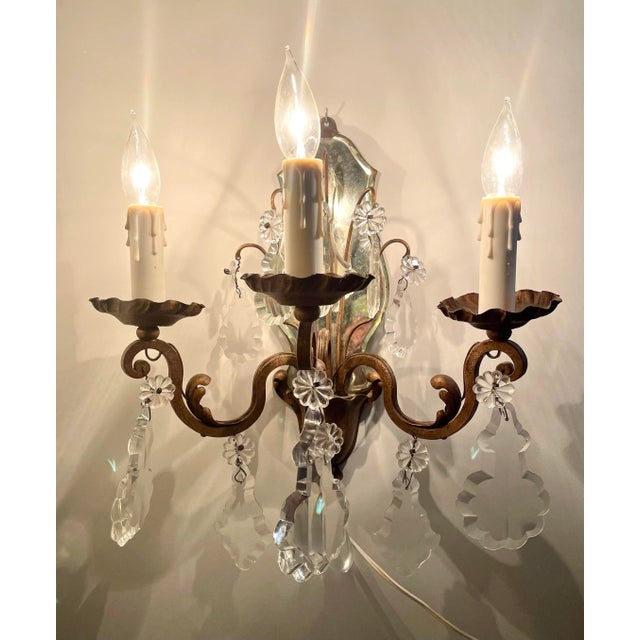 Here is an incredible PAIR of 3-arm sconces that are wall-mounted and currently wired for plug-in application. They are...
