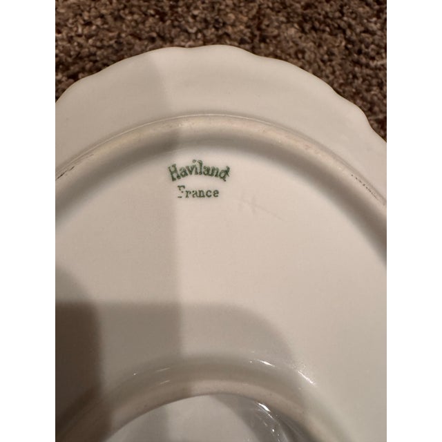 Charming Haviland porcelain gravy boat with scalloped edges. Includes matching saucer. Ideal for serving gravies and...