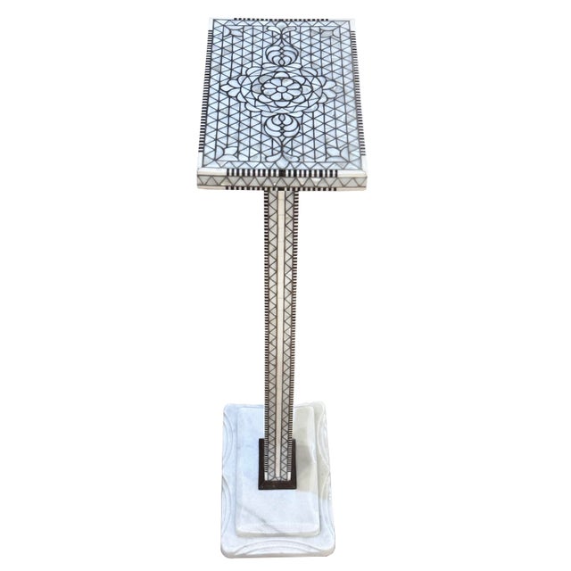 A sophisticated expression of Syrian craftsmanship, this modern pedestal side table features the timeless art of hand-...