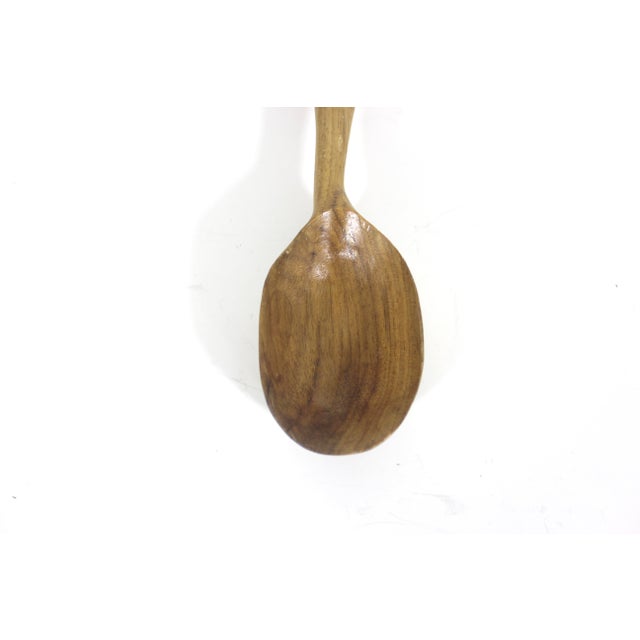 Vintage hand carved wooden spoon in the style of a Welsh love spoon with a calla lily handle. The last photo shows other...
