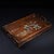 This is an exquisite vintage hardwood tray featuring intricate mother-of-pearl (nacre) inlay and striking architectural...