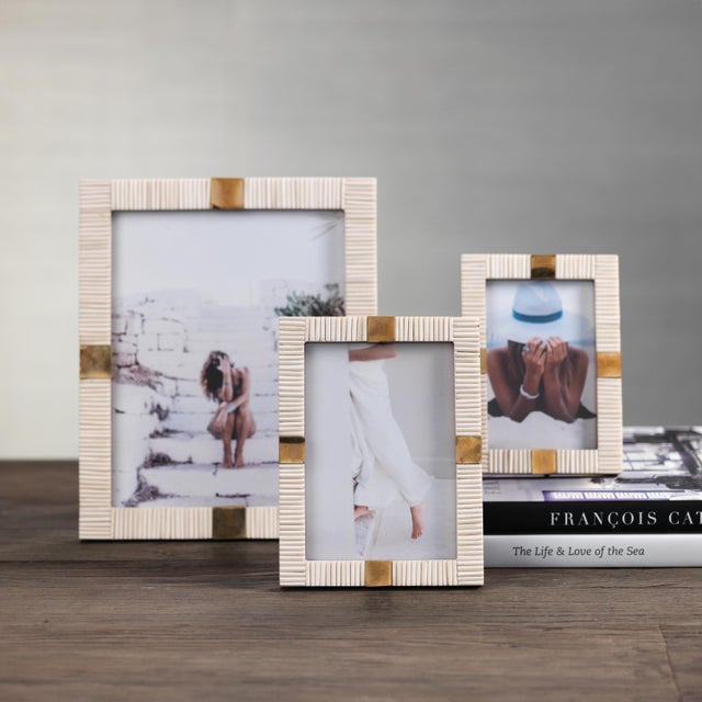 Our Maha Bone Frame’s unique composition is sure to attract the eye to your favorite photos. Its coastal vibe features...