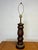 Beautifully turned wood lamp. Classically shaped for broad appeal with wonderful patina. Masculine formed body offset by...