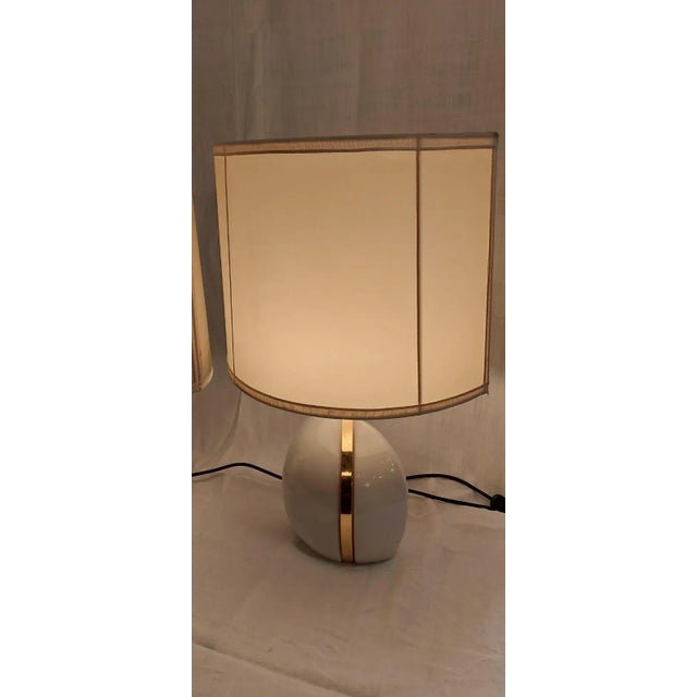 Vintage Table Lamps from Lumi Milano, Set of 2, in Very Good conditions. Designed 1980 to 1989 This piece has an...