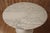 Knoll Tulip table by Eero Saarinen. Round 107 cm Calacatta marble top. Cast iron base with Rilsan coating. Stamped under...