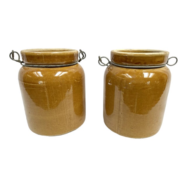 Antique Glazed French Crocks With Metal Carriers - a Pair For Sale