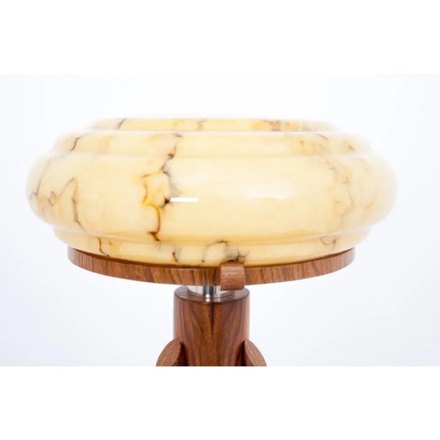 Beautiful table lamp from the mid-20th century in the Art Deco style. The style is characterized by simple design,...