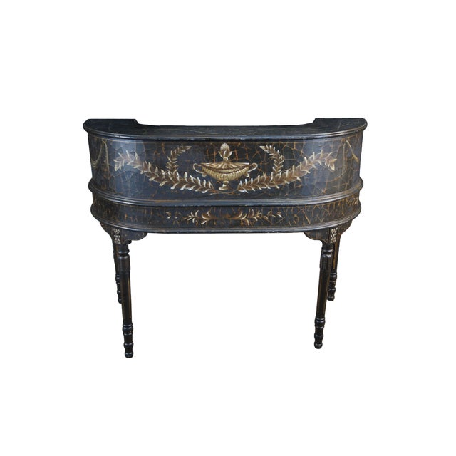 Late 20th Century Carlton House Writing Desk. Features a chinoiserie lacquered exterior with a bow shaped form featuring a...