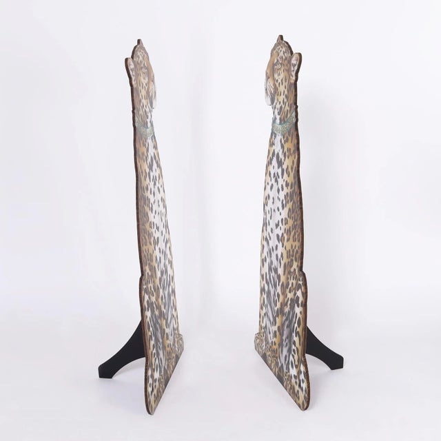 Standout pair of leopard silhouettes crafted in wood with bold realistic printed images. Signed by artist Katherine...