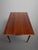 Compact at 120 cm for everyday dining, the table extends to 210 cm when additional seating is needed. Its warm teak grain,...