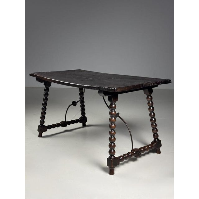 Spanish Table, 18th Century. Originally from Spain. Dating from the 18th century. Made of walnut. with a bobbin motif in...