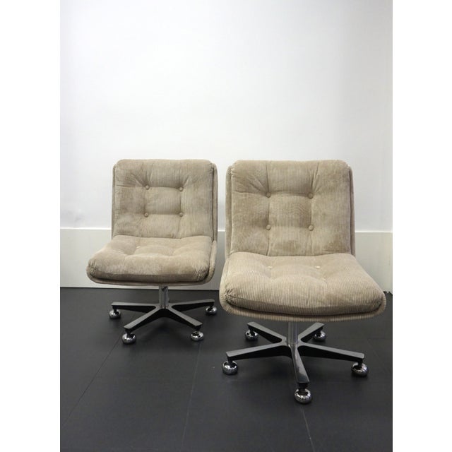 Pair of Italian armchairs from the 1970s, manufactured by Leyform, an Italian company that began furniture production in...