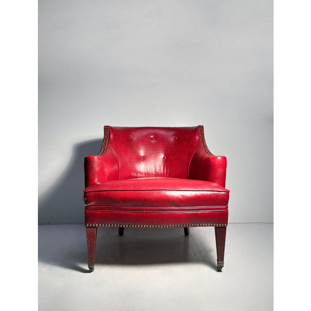 An attractive vintage red "faux" leather decorator chair. In the manner of Edward Wormley for Dunbar and Syrie Maugham....