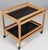 Børge Mogensen tray table with frame of oak. Plates of black laminate. Mounted on wheels. Model 5370, made by Fredericia...