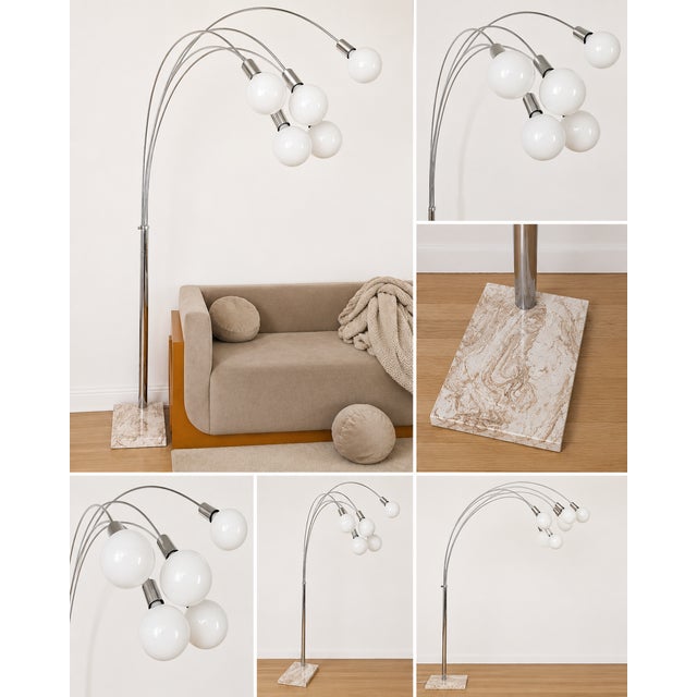 A striking vintage floor lamp by Nova of California featuring four sweeping brass arc arms terminating in globe bulbs. The...