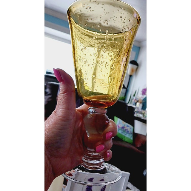 Stunning vintage amber bubble glass tall wine and martini glasses. Hard to find beautiful golden color with bubbles, hand...