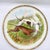 A beautiful antique porcelain cabinet plate featuring a dynamic sporting dog illustration by renowned wildlife artist R.K....