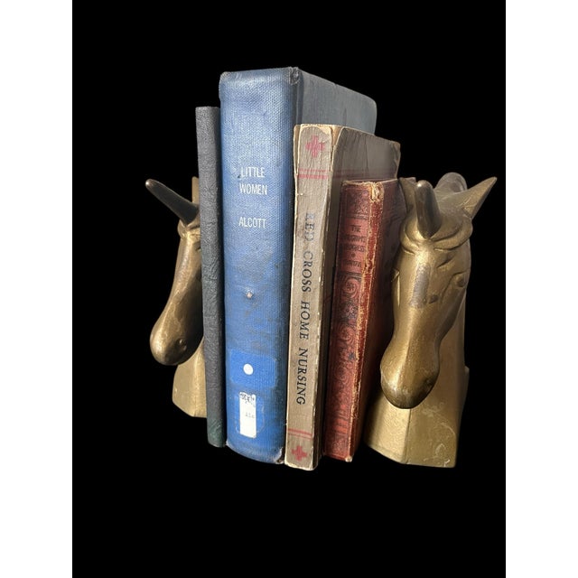 Gorgeous, mid-century, modern brass bookends featuring the elusive unicorn!