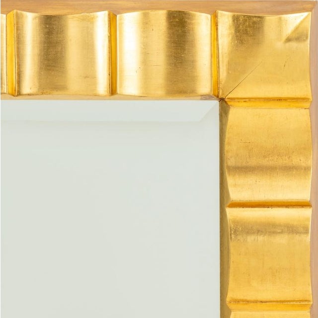 Contemporary Giltwood Beveled Mirror, with wave form frame. 54" H x 43.5" W x 1.5" D. Keywords: Looking glass, Wall...