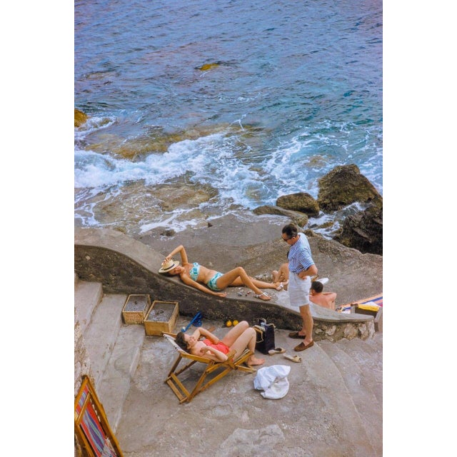 Shades and Skis by Toni Frissell Sunbathers conversate by the coastline of Capri, 1954. (Photo by Toni Frissell) 16x12"...