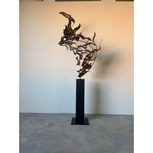 A mesmerizing example of contemporary metal art, this 2013 modern floor sculpture by Curtis Jere— of Flying Birds—captures...