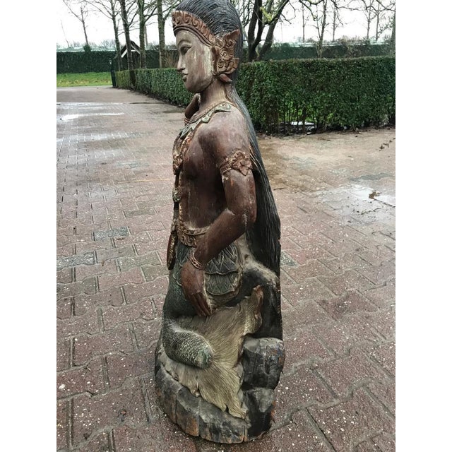This authentic antique hand-carved wooden sculpture dates to the late 18th–early 19th century and represents a powerful...