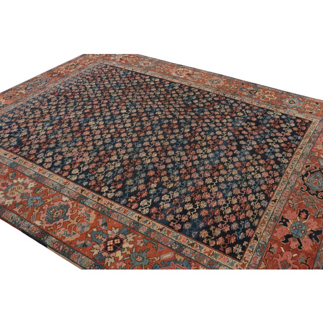 Hand-knotted in wool, this 8x10 rug, originating from Persia, circa 1920-1930, is a very special antique Persian Bakshaish...