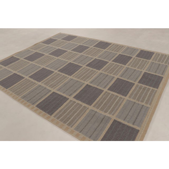 Handwoven in luxurious alpaca yarn, this 8x10 flatweave is a sophisticated new addition to Rug & Kilim’s Scandinavian...