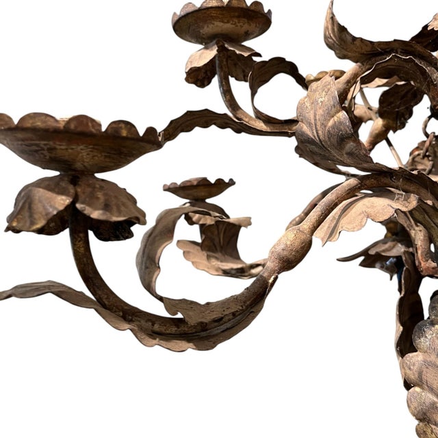 An exquisite 18th century Piemontese chandelier handcrafted from painted tole, showcasing the refined artistry and...