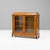 Two door glazed walnut bookcase / cabinet with ormolu mounts on turned feet. Circa 1870. This piece is attributed to the...