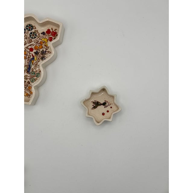 A handcrafted 5 piece star-shaped ceramic serving and dip platter set or trinket dish featuring painted fish and floral...