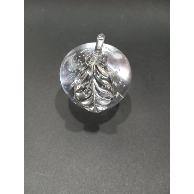 Add a touch of vintage charm to your desk or bookshelf with these two hand-blown paperweights. They are mid-century modern...