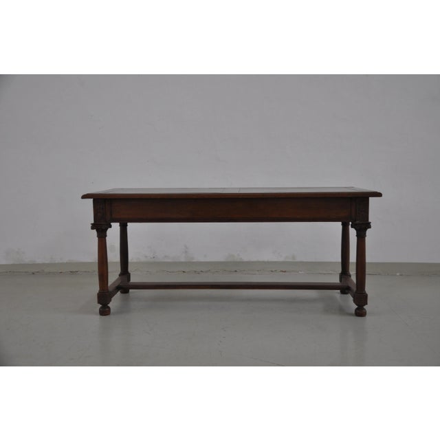 Solid elm wood table, missing a piece as per photos.