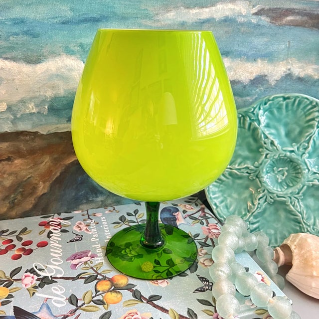 A MidCentury lime green Italian art glass in the shape of an oversized brandy snifter making a beautiful accent piece.