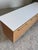Modern locking blonde credenza, very heavy and well made, featuring a floating stone top, brushed aluminum and adjustable...