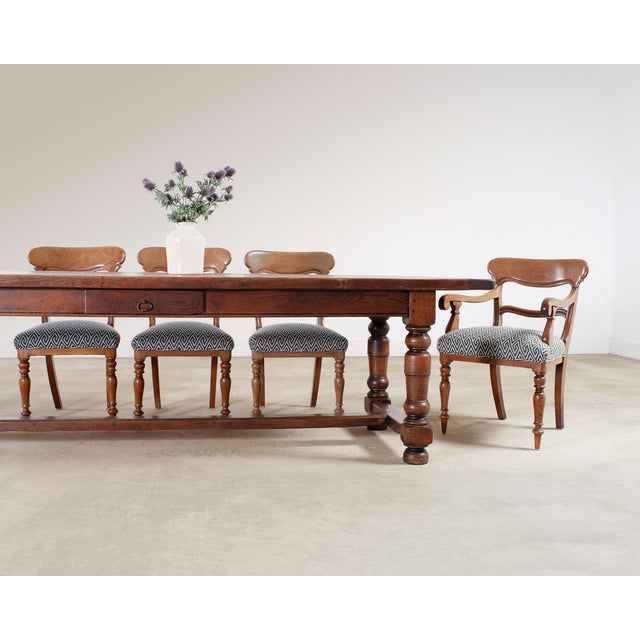 A refined set of six 19th century English Willian IV dining chairs comprising of two armchairs and four side chairs. The...