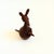 A mid century turned wood figurine in the shape of a Kangaroo. Adorable stylized features. Made in Japan by Senshukai as...
