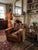 Authentic 1950s leather club chair. with its high, faceted back (Art Deco style) and generous armrests, it boasts a...