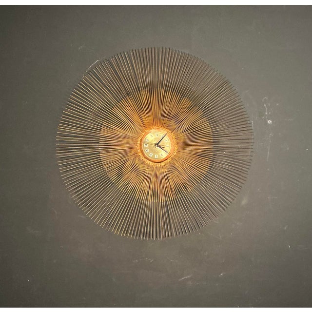 Large 35" x 35" vintage Brutalist sunburst starburst battery operated clock wall sculpture from the 1960s or 1970's....