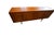 An extremely elegant and tasteful sideboard in teak, designed by Johannes Andersen for Uldum Møbelfabrik in Denmark. An...