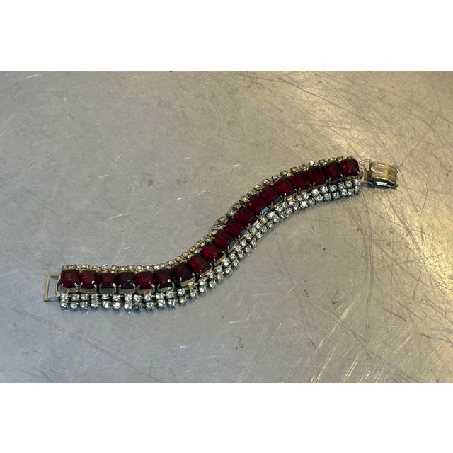 1950s-60s large red rhinestone/clear rhinestone gold-tone chunky link cuff bracelet. Excellent condition.