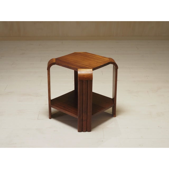 An elegant and authentic British Art Deco side table dating from the 1930s. This charming piece perfectly captures the...