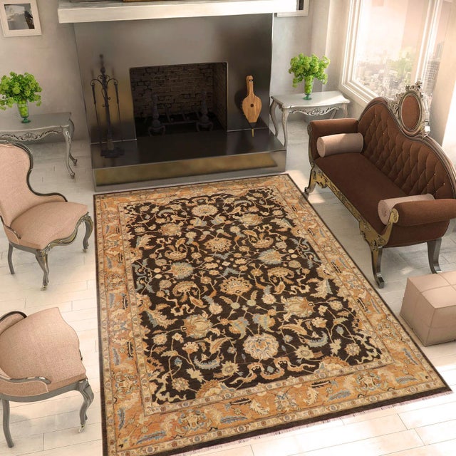 "Enhance the ambiance of your home with this magnificent Persian-influenced Turkish hand-knotted rug made by skilled...