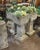 A set of four handsome English garden planter pots - each planter featuring a square top over a sqaure column pedestal...