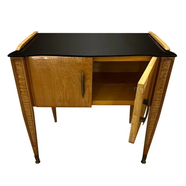 A lovely pair of bedside tables - neat, elegant design with good storage. These nightstands have stylish black glass tops...