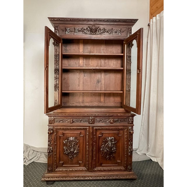 Handcrafted from solid French oak, this antique Normandy hutch is a striking example of regional French craftsmanship,...