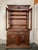 Handcrafted from solid French oak, this antique Normandy hutch is a striking example of regional French craftsmanship,...
