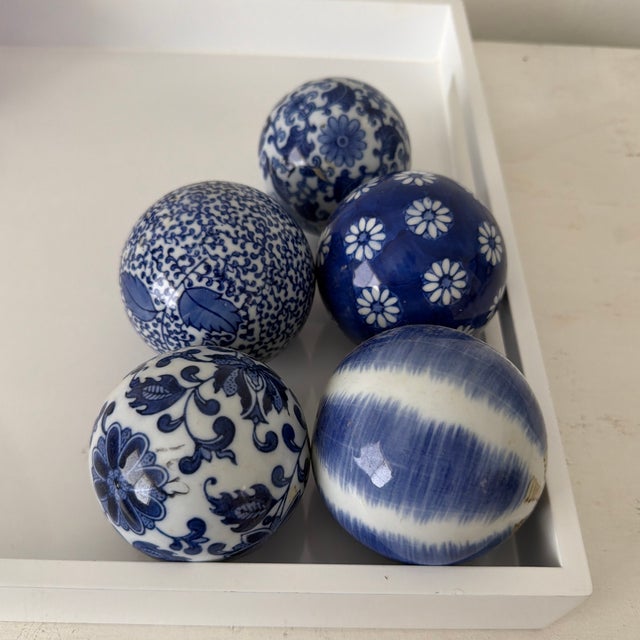 Set of five blue and white Export ironstone Chinoiserie decorative spheres.